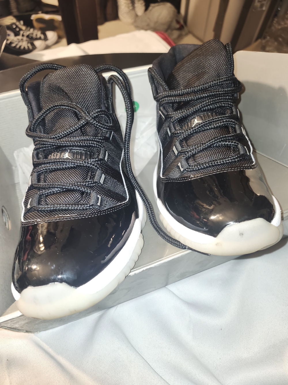 Jordan Black and White Low-Top Patent Leather Sneakers